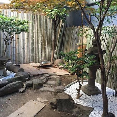 Gomaharu Guesthouse Osaka Bagian luar foto