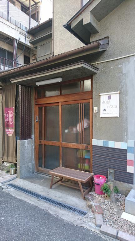 Gomaharu Guesthouse Osaka Bagian luar foto