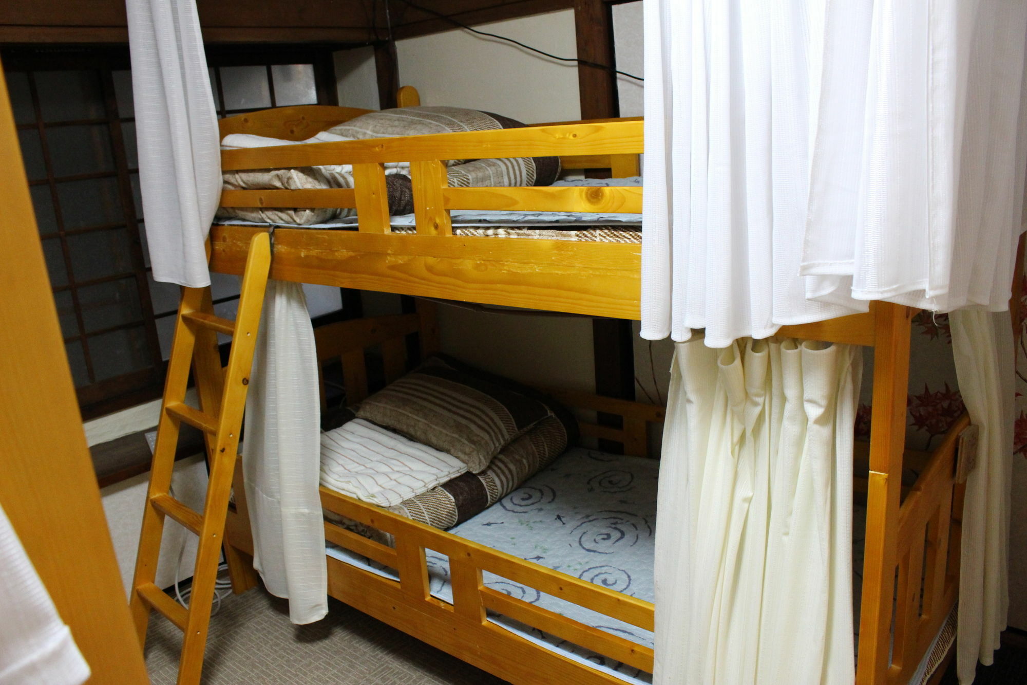 Gomaharu Guesthouse Osaka Bagian luar foto